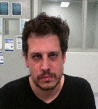Milo Yiannopoulos er sett på et bilde lagt ut på sosiale medier av USAs Department of Homeland Security på fredag (Fil: DHS)